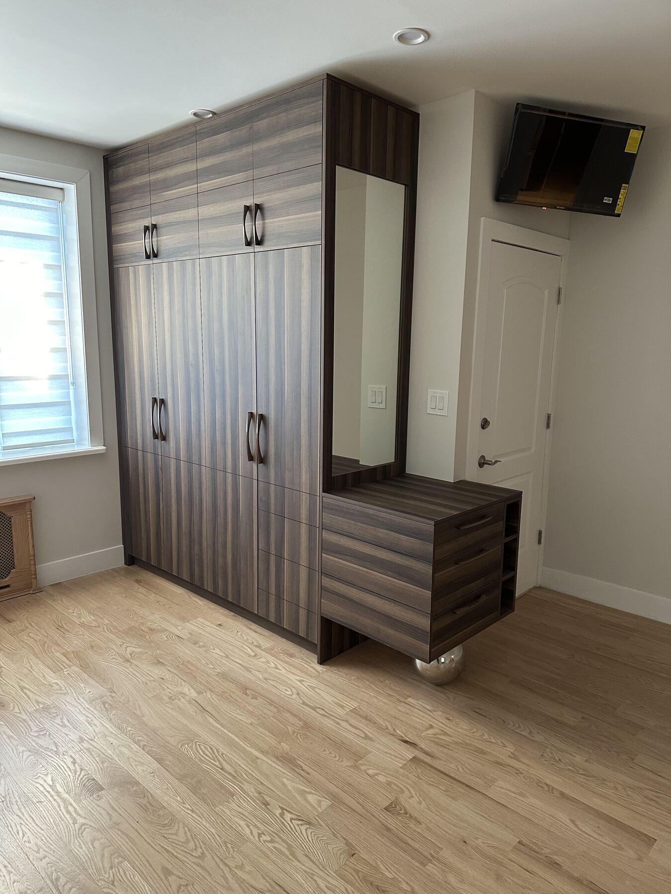 Wardrobe with attached mirrored vanity console