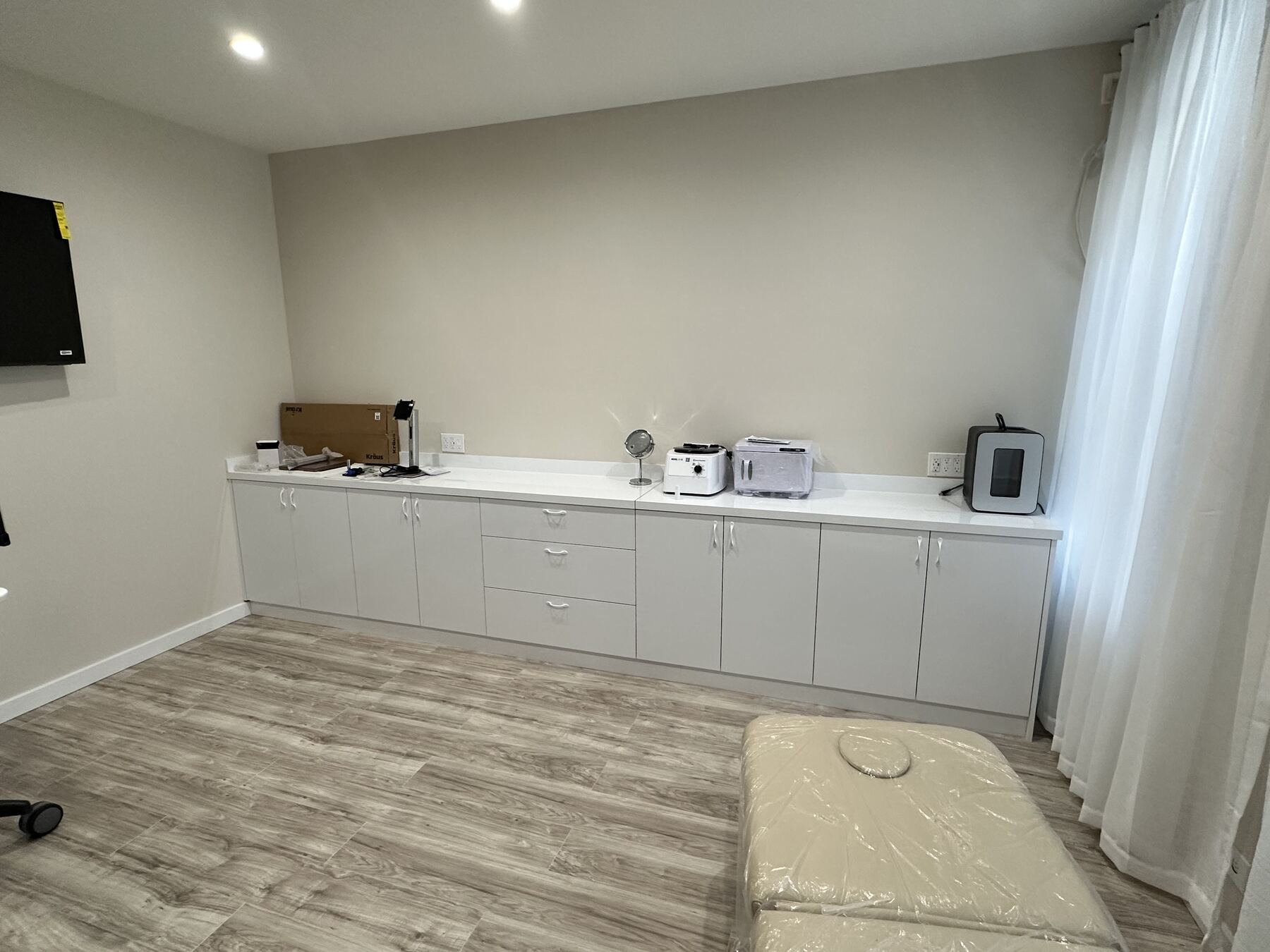Spa treatment room custom cabinetry